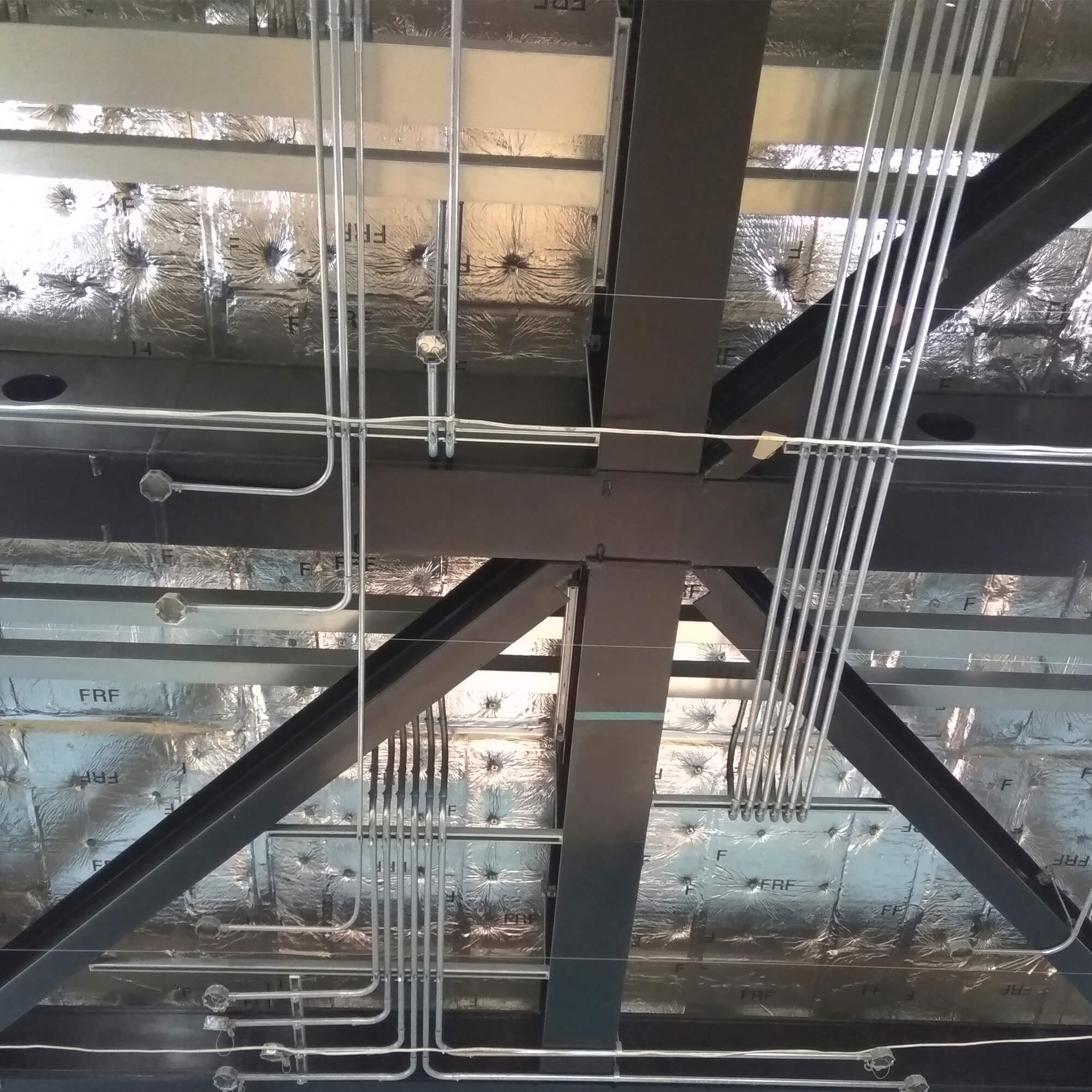 Ceiling piping for light fixtures Ceiling piping for light fixtures