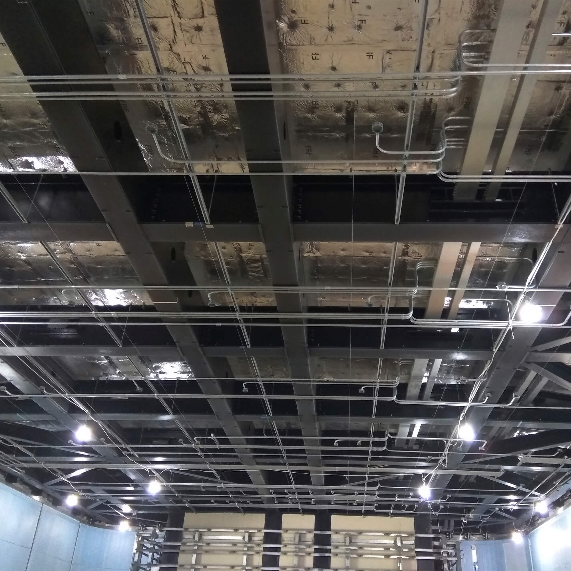Ceiling piping for light fixtures Ceiling piping for light fixtures
